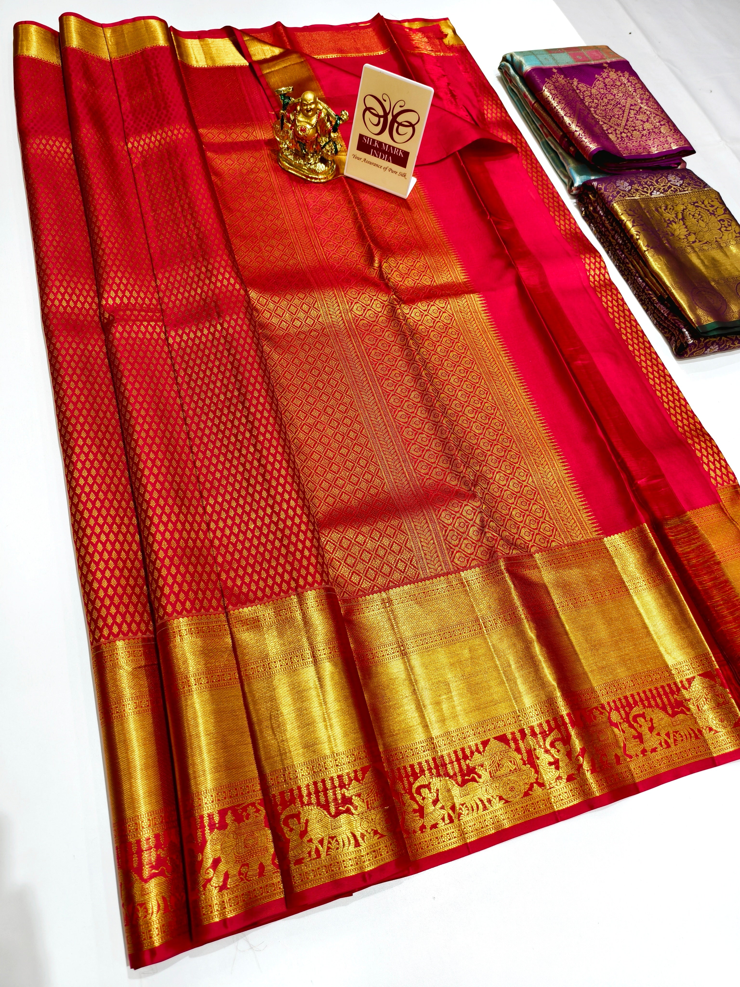 Kanchipuram pure silk wedding saree in vibrant colors with intricate work