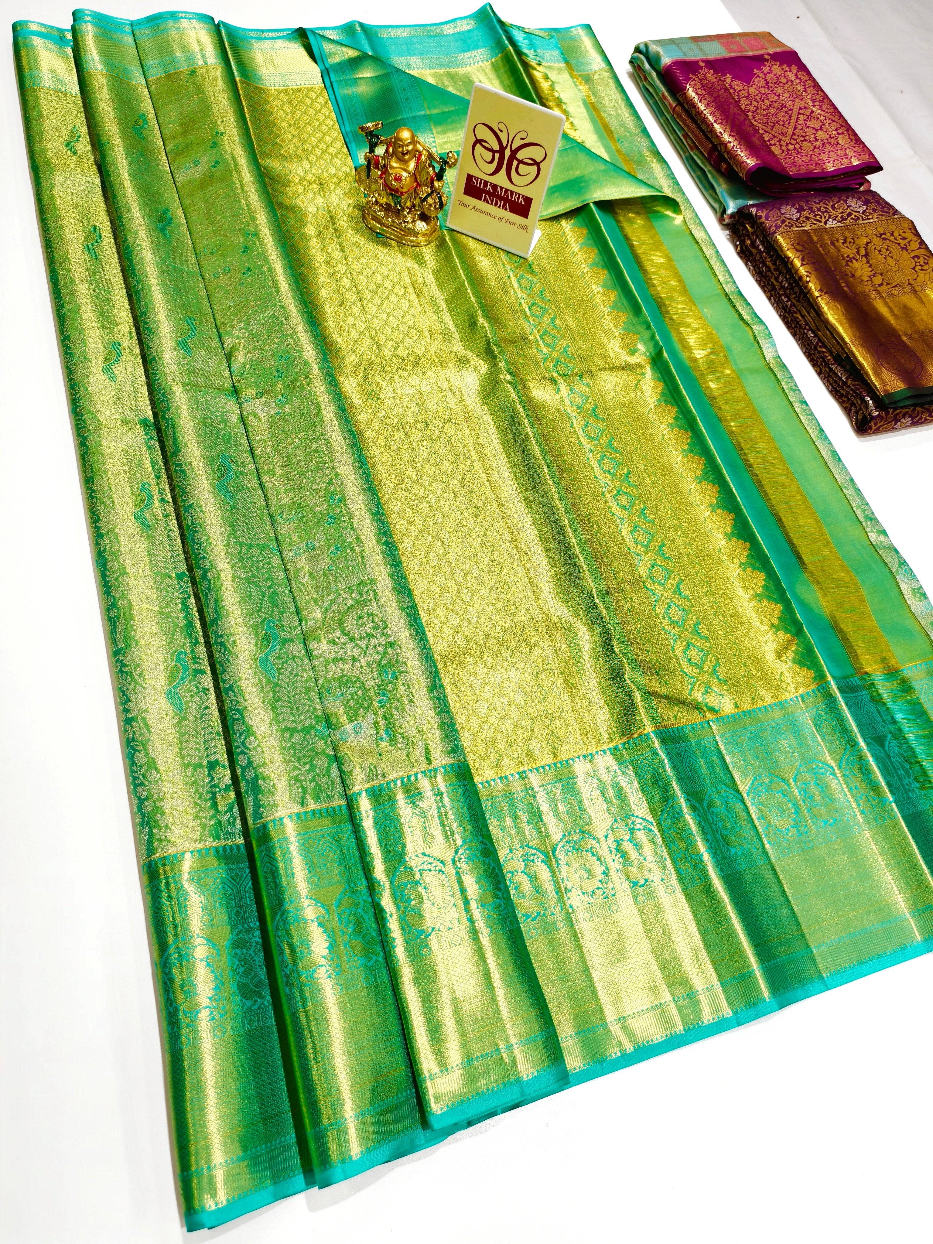 Kanchipuram pure silk wedding saree in vibrant colors with intricate work
