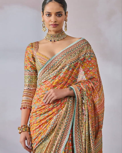 Premium Chinon Silk Saree With Beautiful Print And Mirror Work All Over With Lace On Pallu