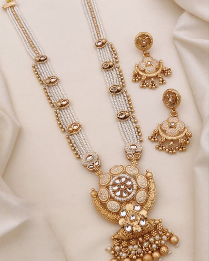 Designer Matt Gold Finish Necklace Set with Handcrafted Detailing and Statement Earrings